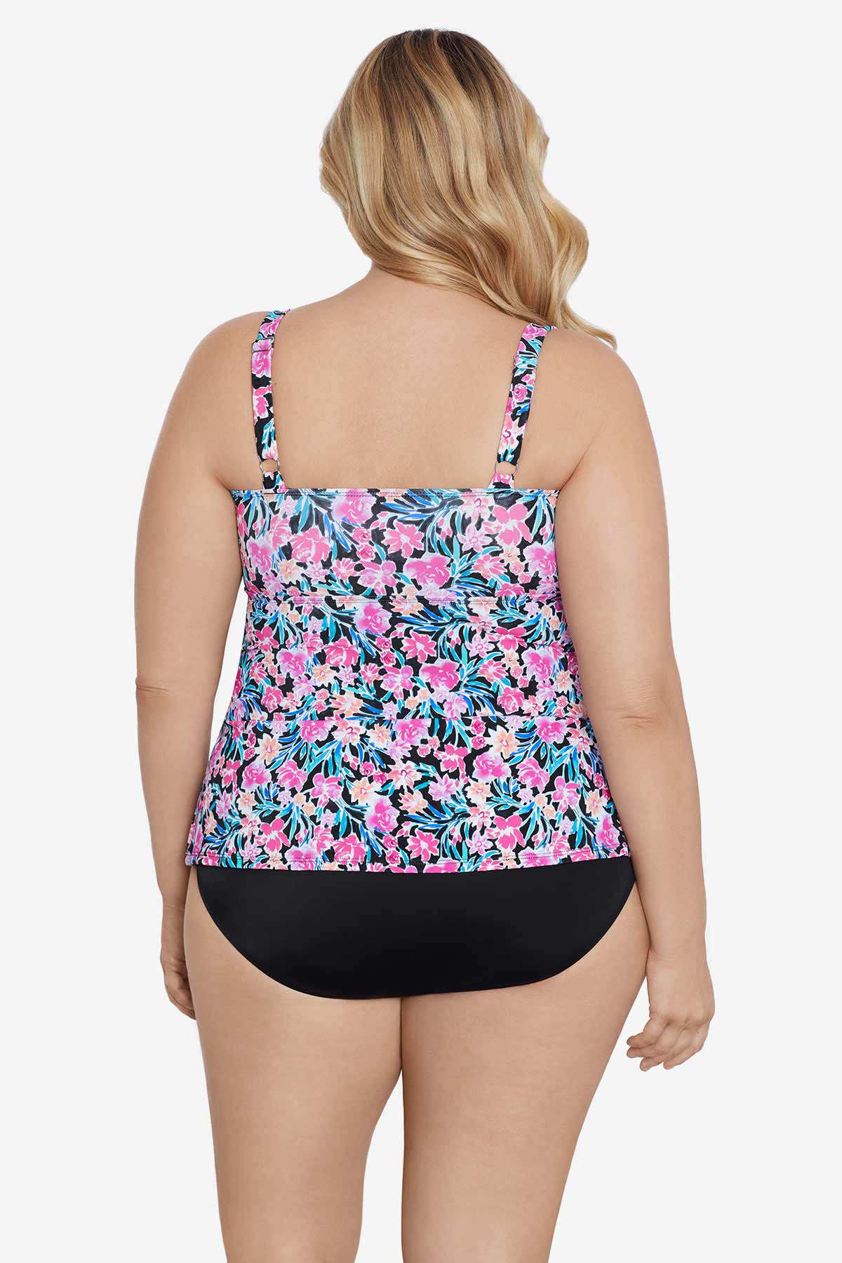 Woman faced away wearing a multicolored floral printed tiered ruffle tankini top
