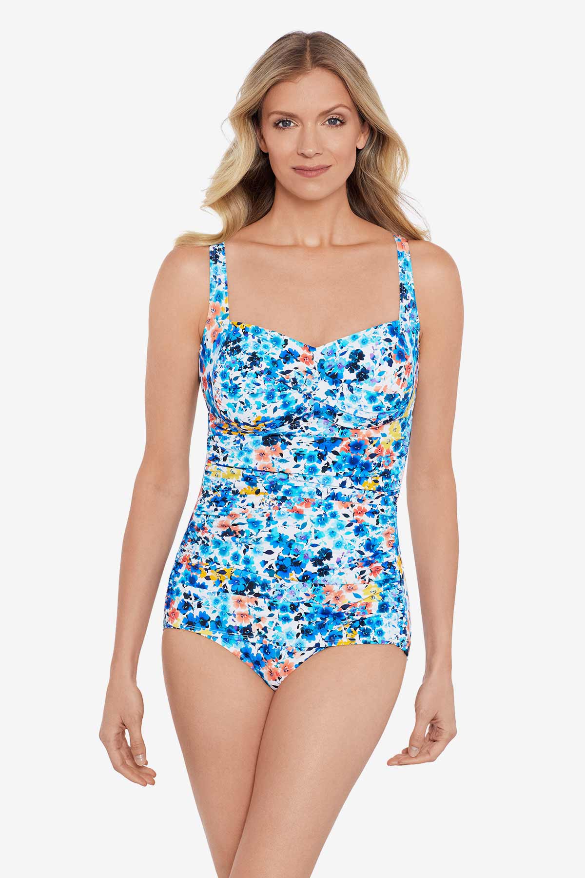 Woman wearing a multicolored small floral printed one-piece swimsuit