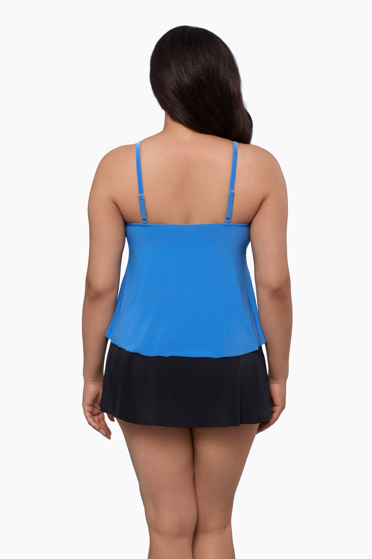 Woman wearing a tankini top in light blue