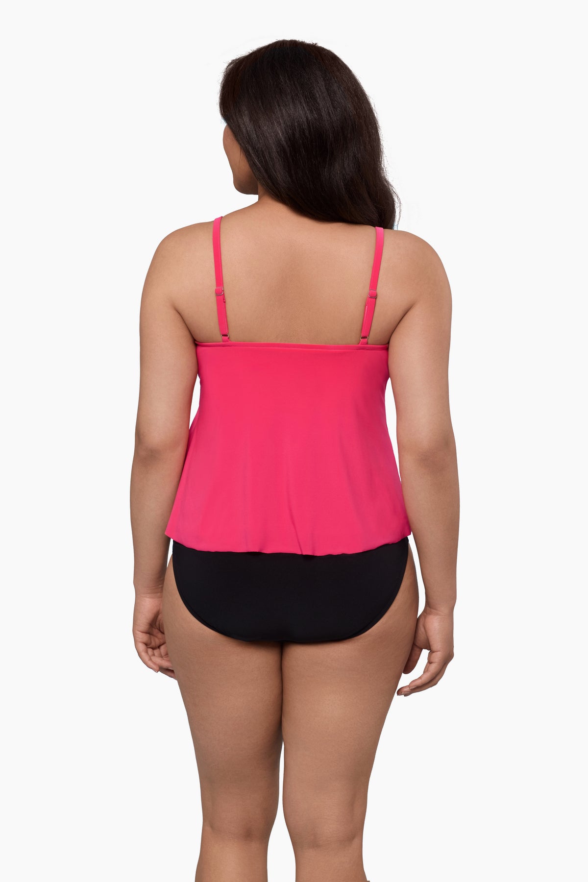 Woman faced away wearing a tankini top in rose pink