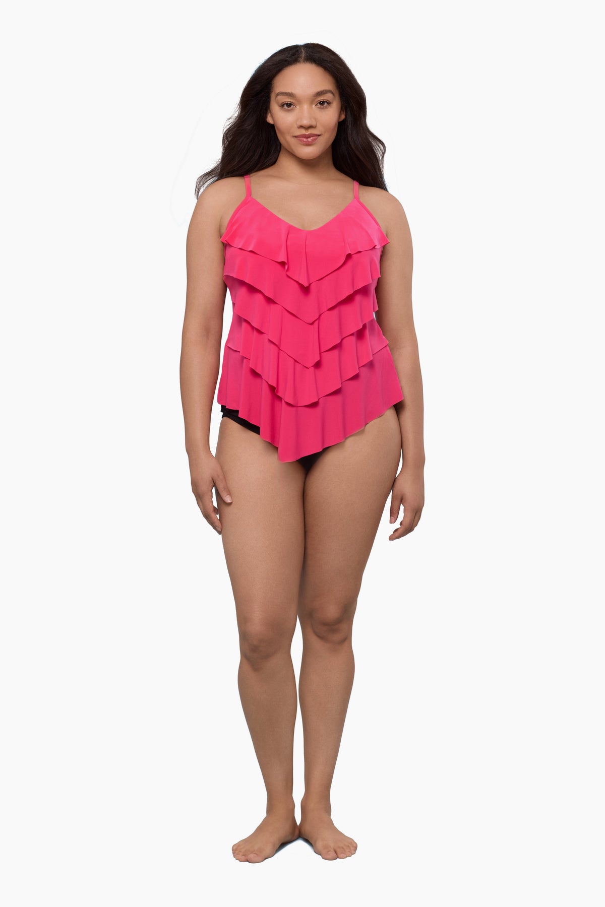 Woman wearing a tiered tankini top in rose pink