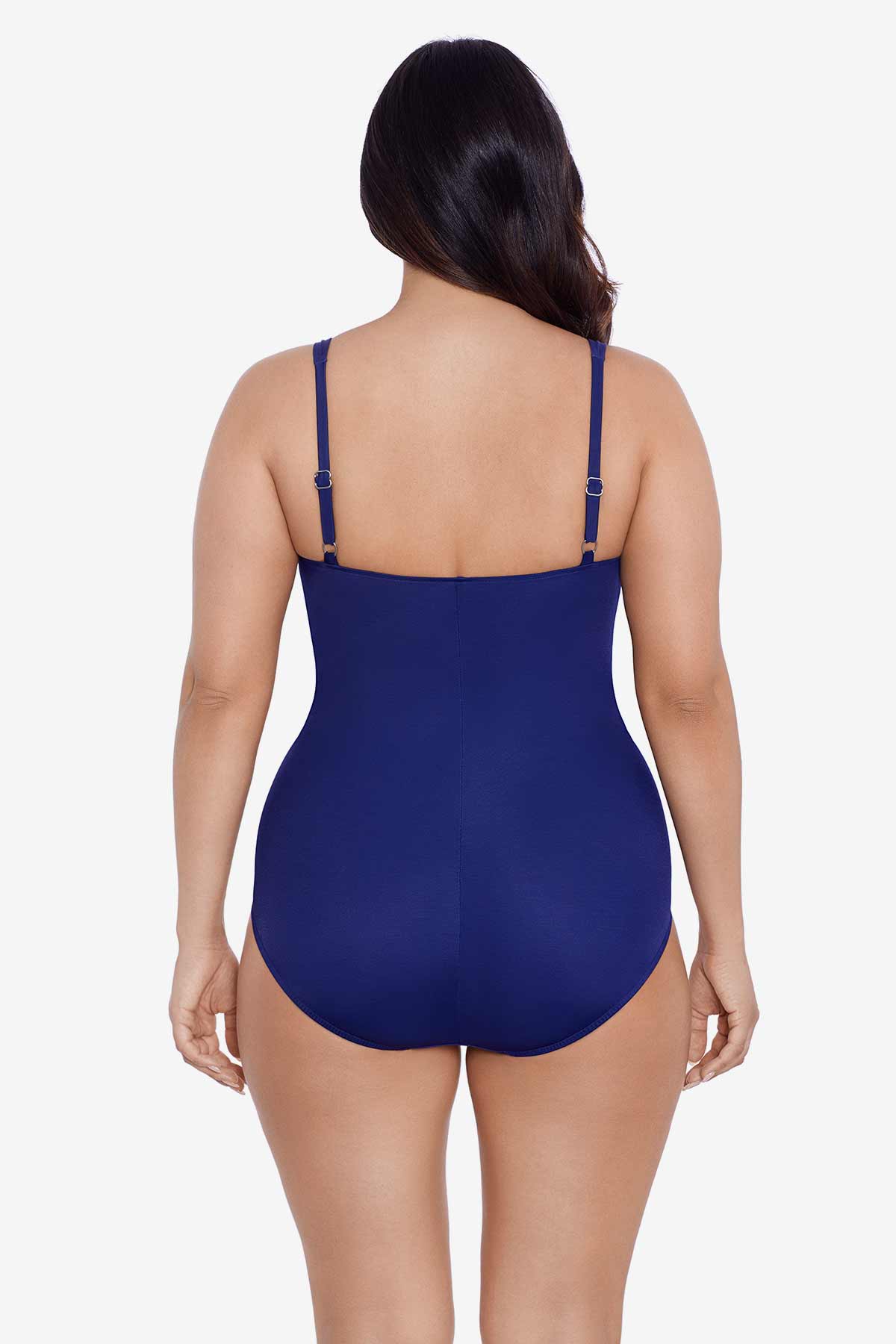 Woman turned away wearing a navy-blue one-piece swimsuit