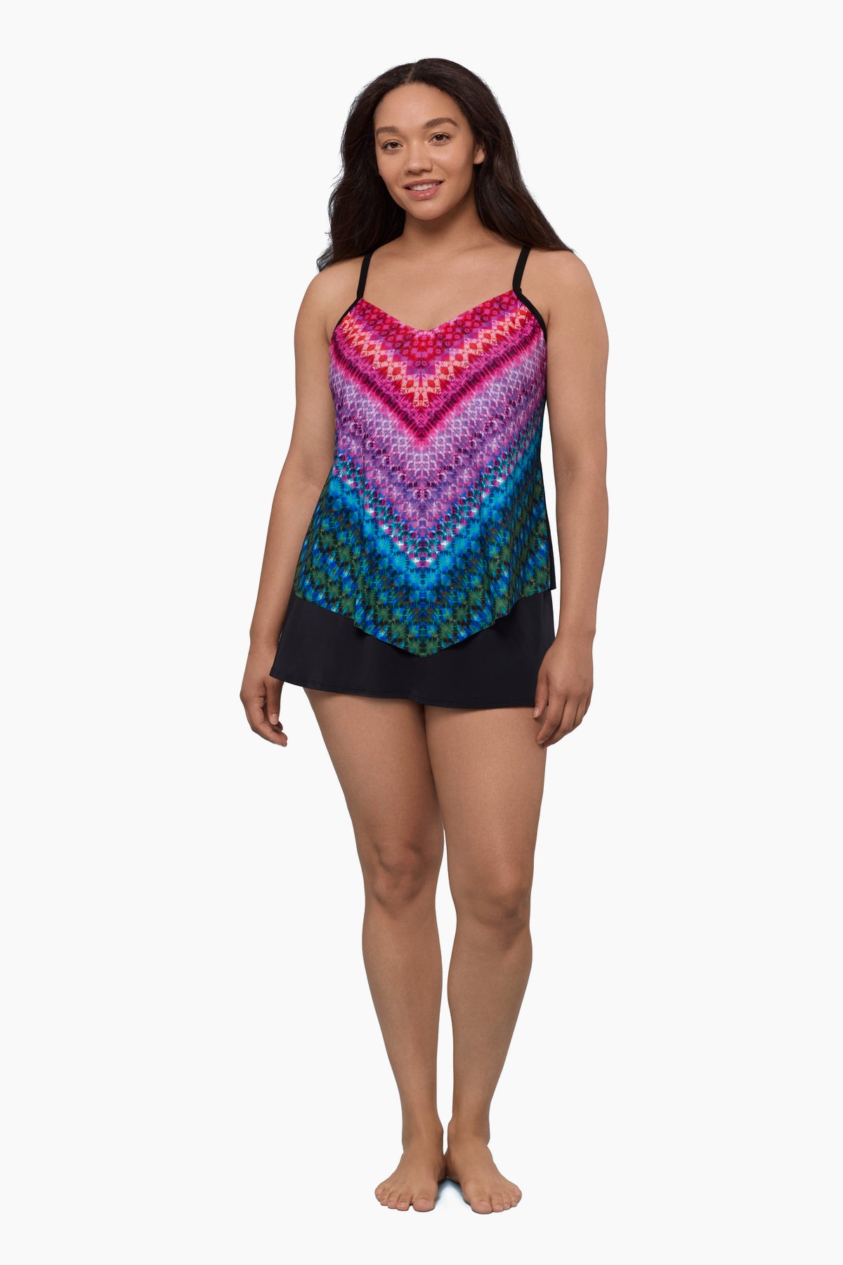 Woman wearing a tankini top with a multicolored geometric print