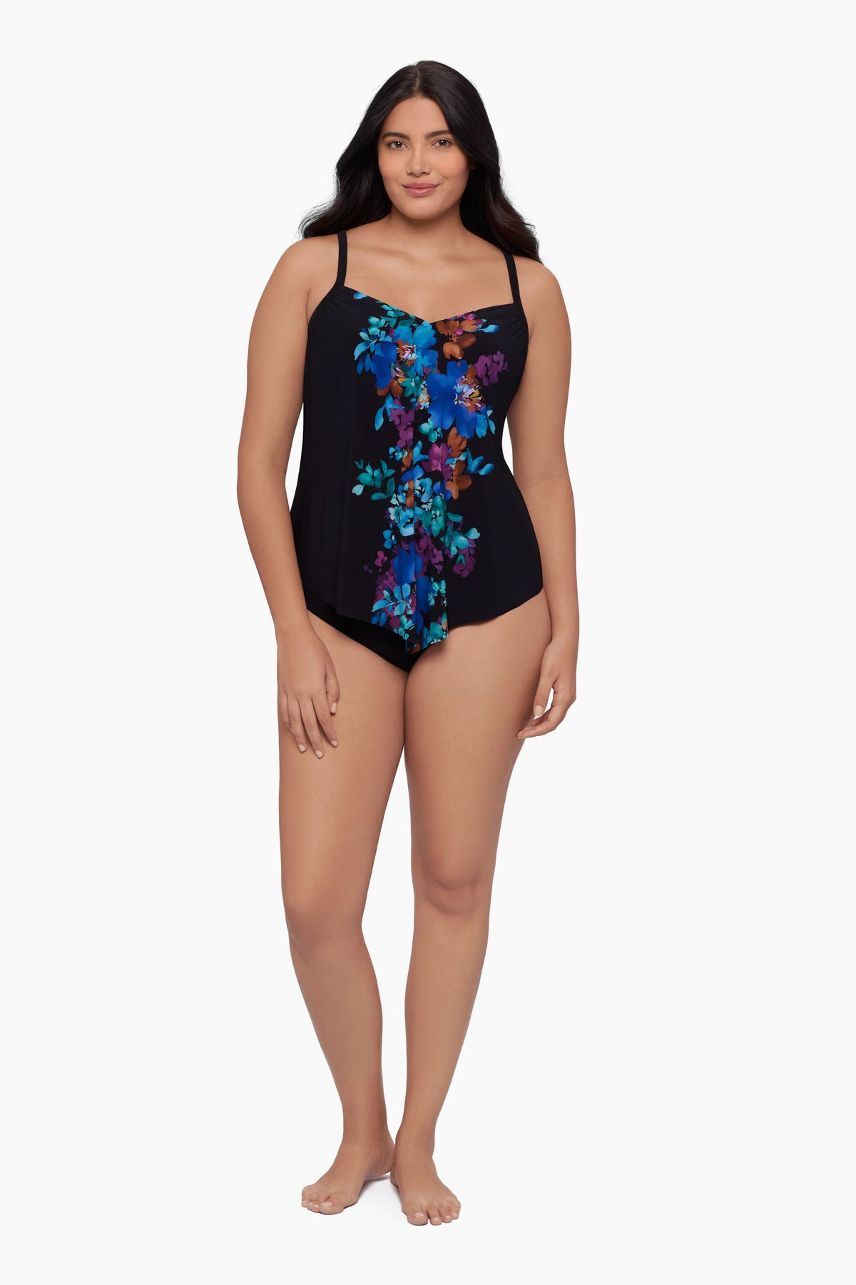 Woman wearing a tankini top with a floral pattern down the middle