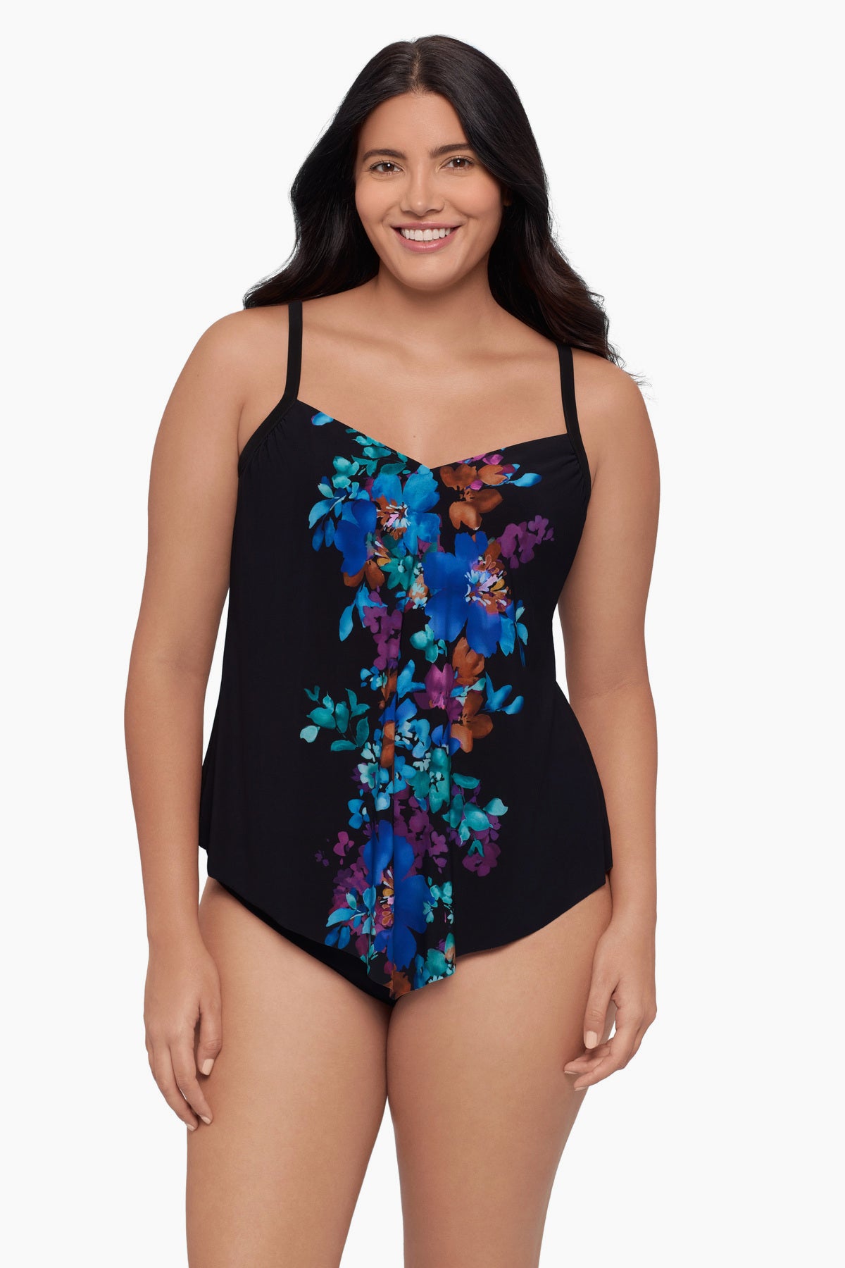 Woman wearing a tankini top with a floral pattern down the middle