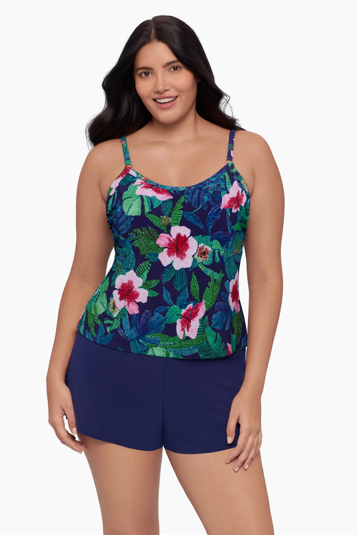 Woman wearing a swim romper with a floral print