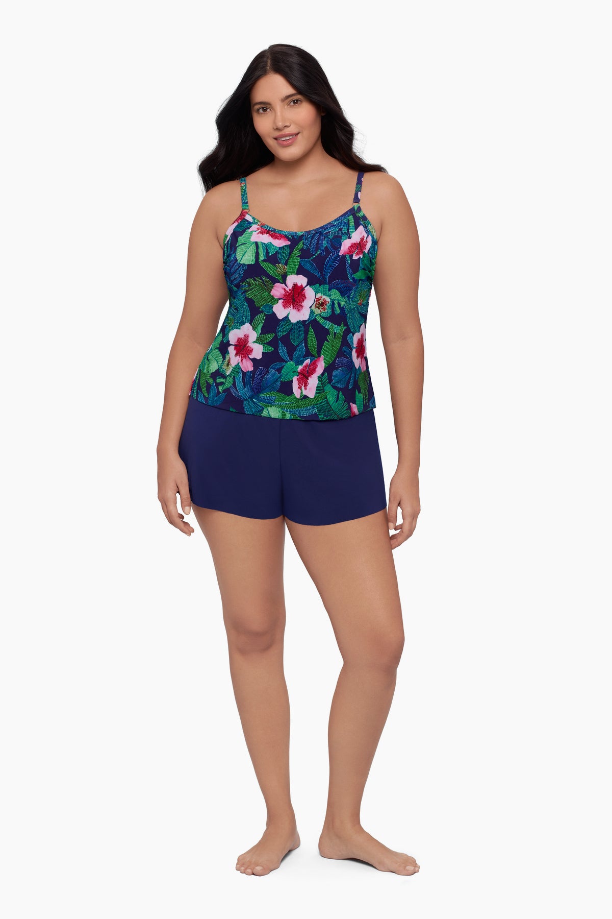Woman wearing a swim romper with a floral print