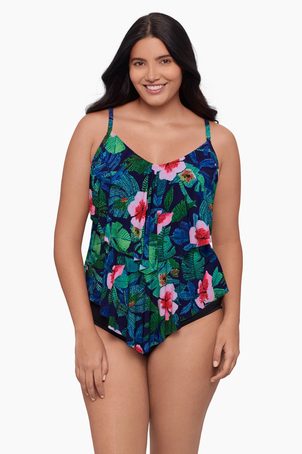 Woman wearing a tankini top with a floral pattern