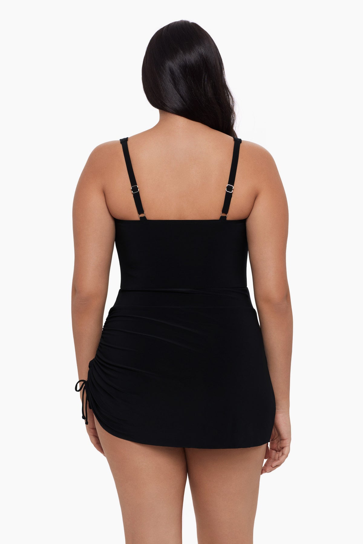 Woman turned away wearing a black swim dress