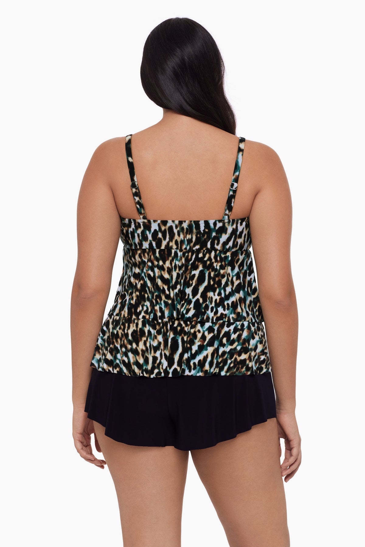 Woman faced away wearing a leopard print tankini top