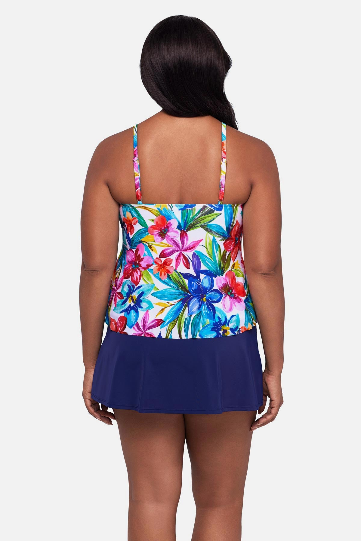 Woman turned away wearing a multicolored floral printed tankini top