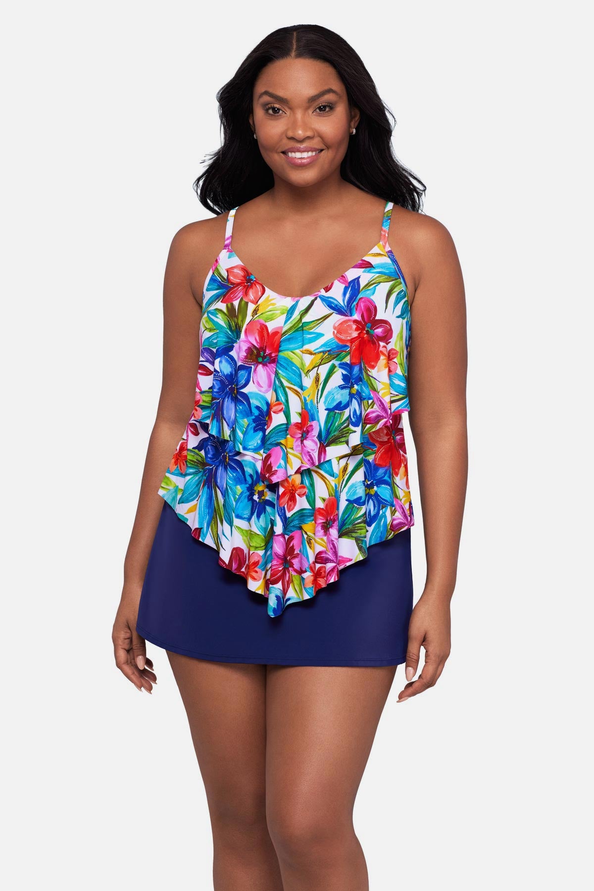 Woman wearing a multicolored floral printed tankini top with ruffles