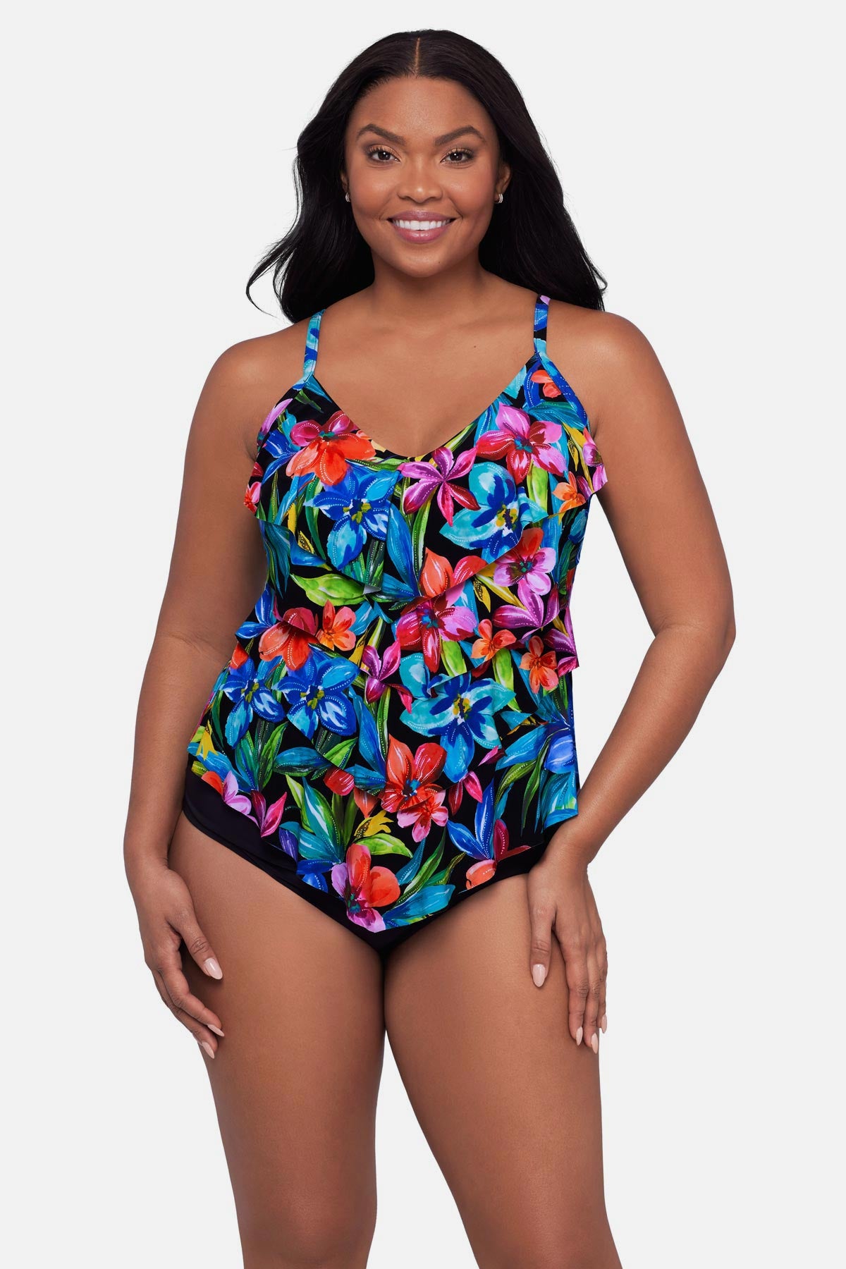 Woman wearing a multicolored floral printed tankini top with ruffles