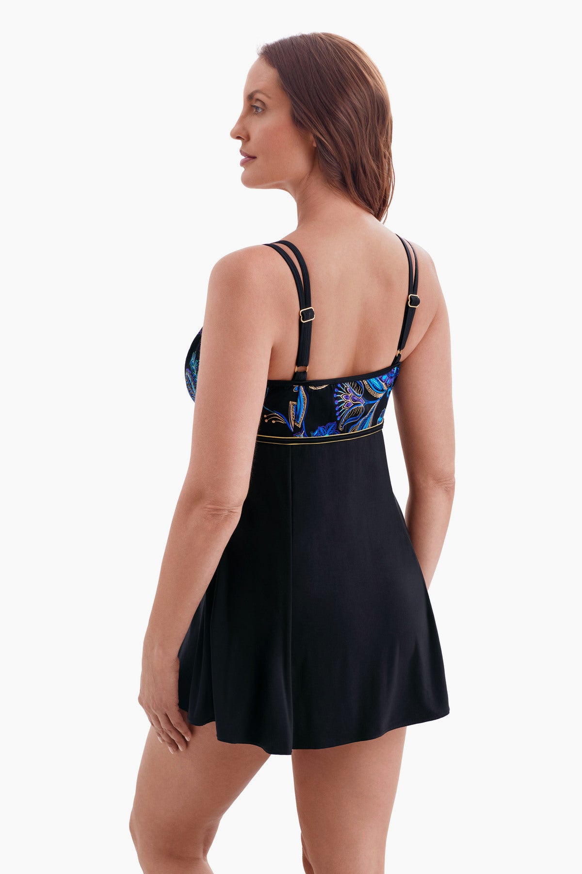 Woman facing left wearing a swim dress