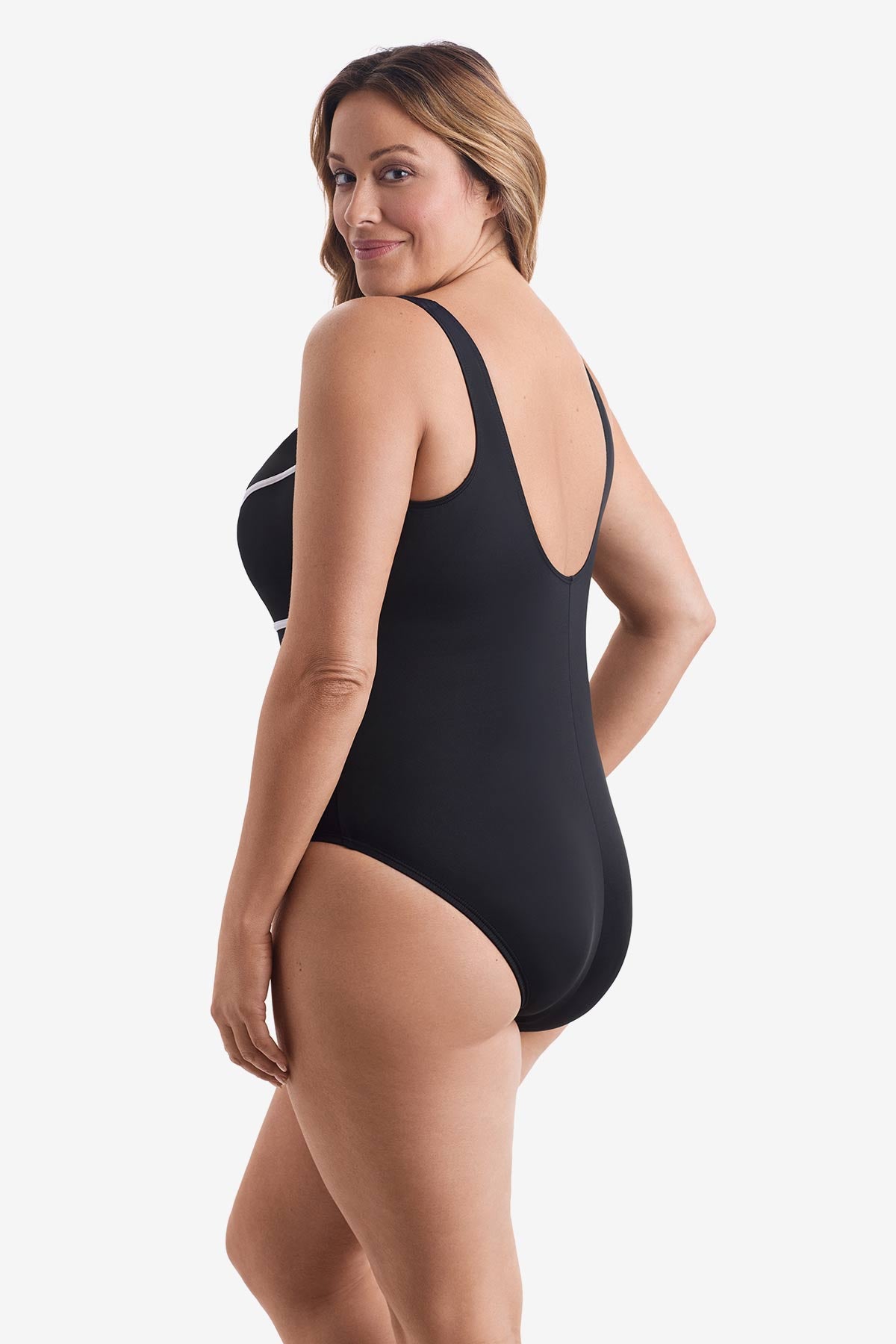 Woman faced left wearing a one-piece swimsuit