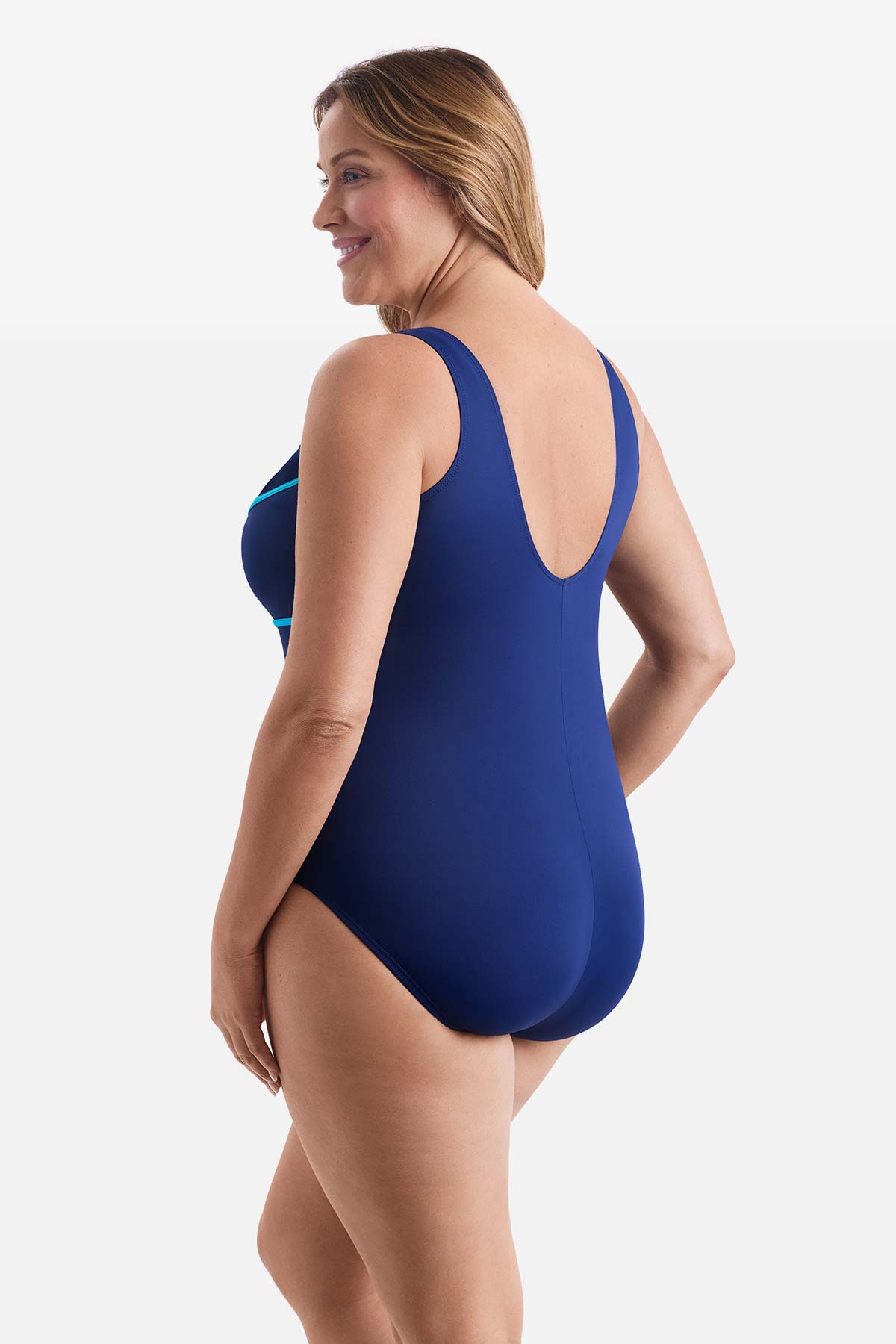 Woman faced left wearing a one-piece swimsuit