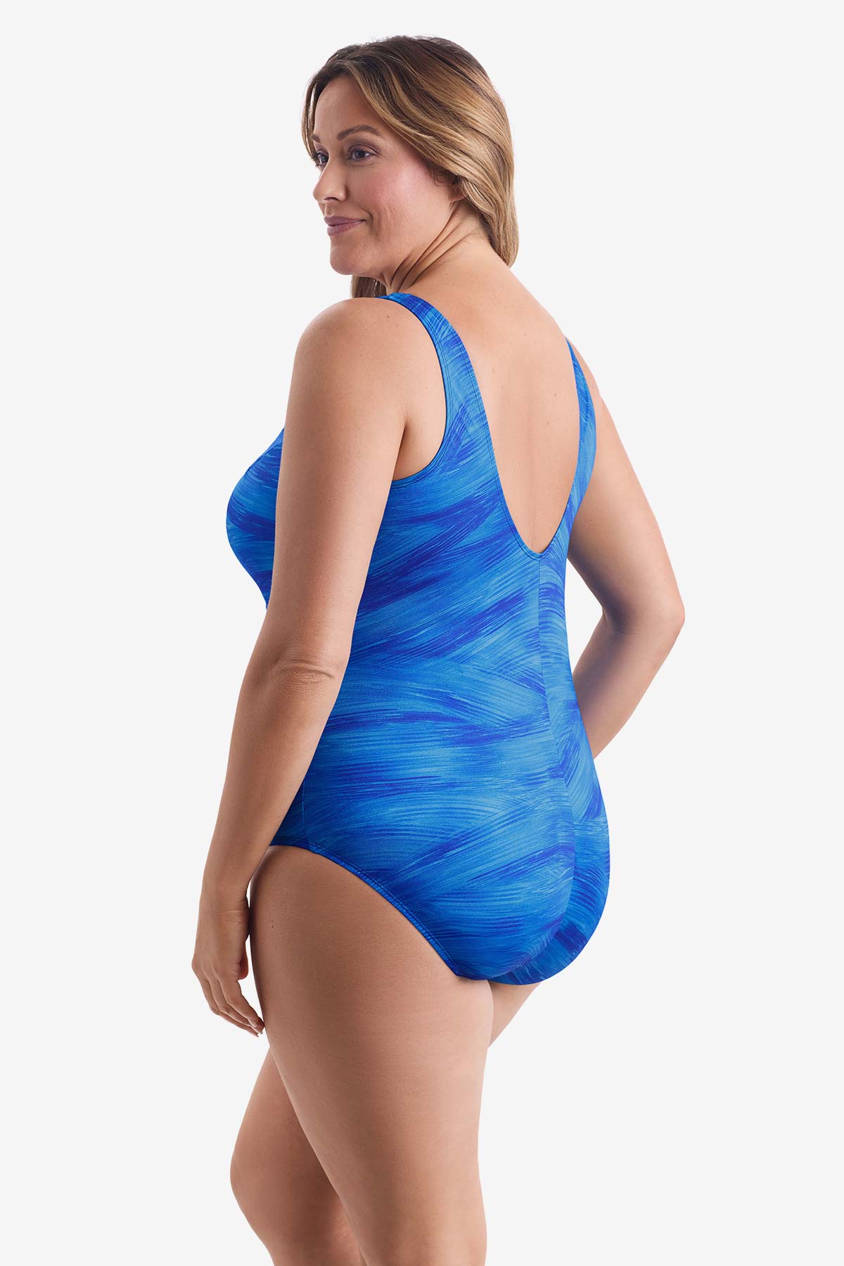 Woman faced left wearing a blue paint brush pattern one-piece swimsuit