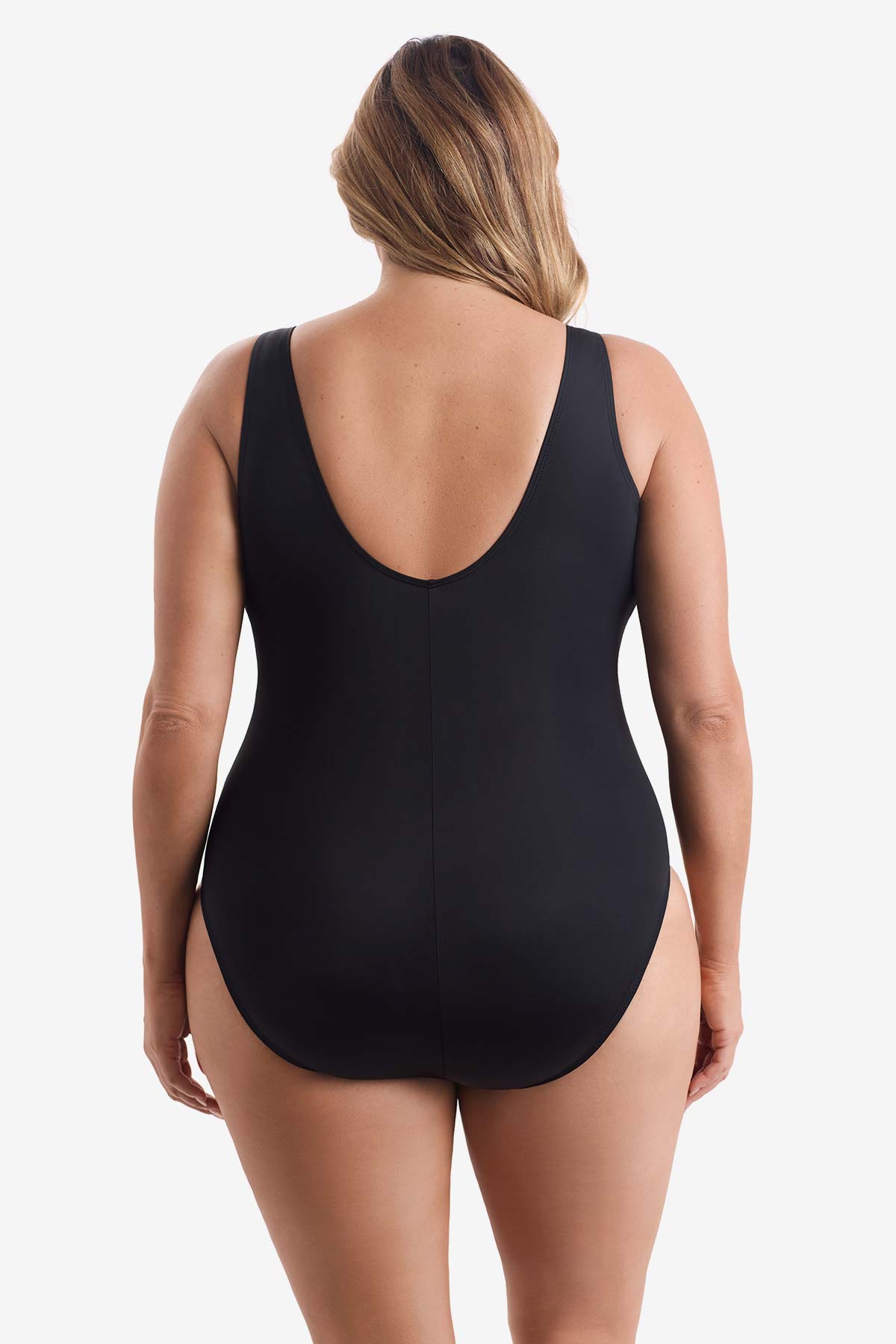 Woman wearing a black one-piece swimsuit