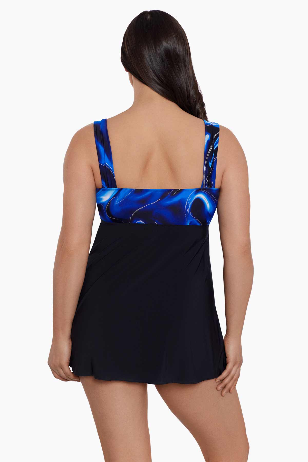 Woman turned away wearing a blue and black oil slick printed bust swim dress