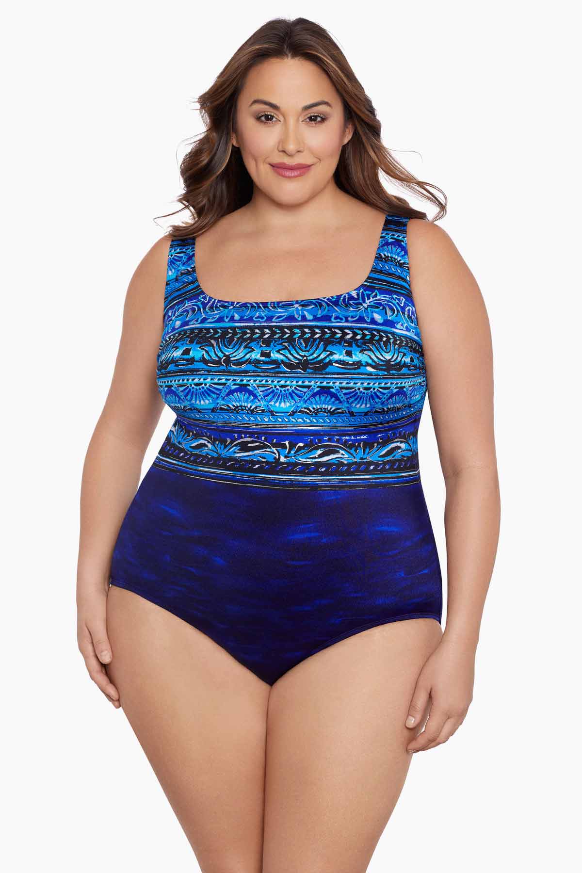 Woman wearing a blue ombre abstract printed one-piece swimsuit