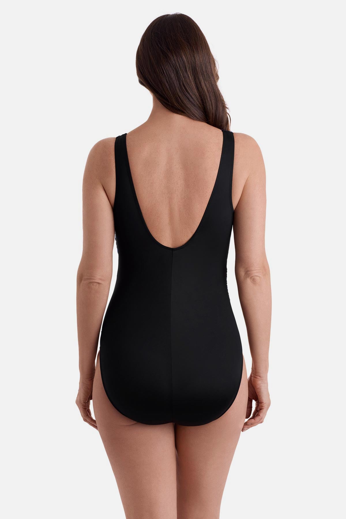 Woman turned away wearing a one-piece swimsuit
