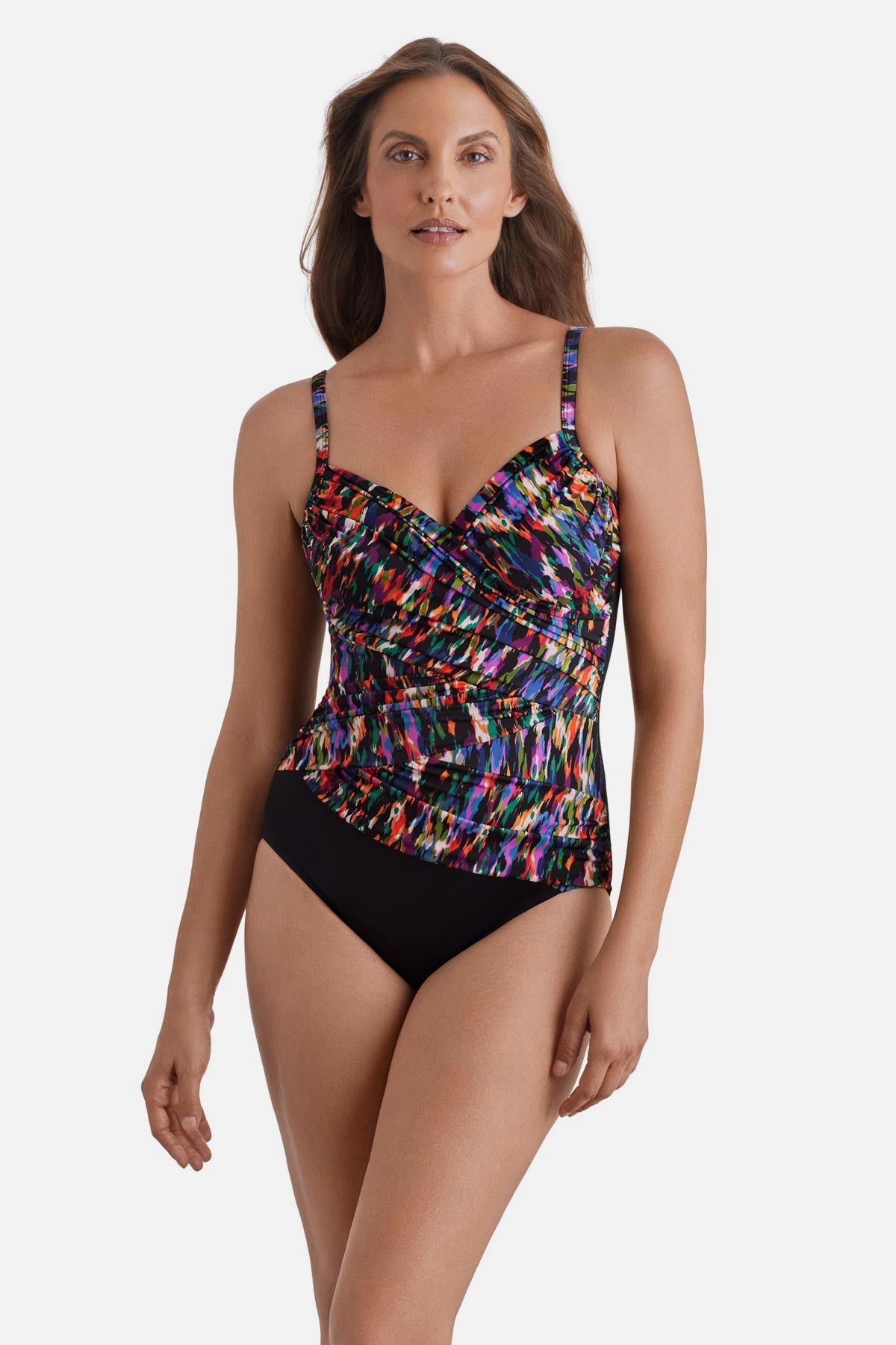 Woman wearing a multicolored abstract printed wrap one-piece swimsuit