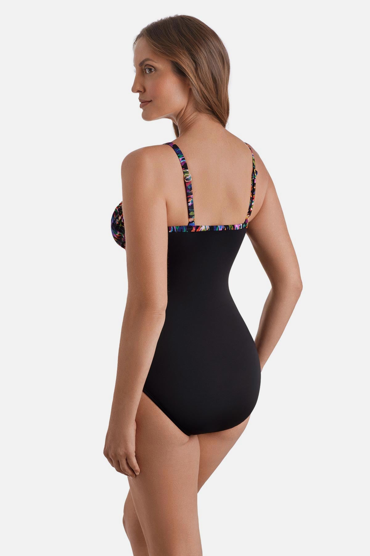 Woman turned left wearing a multicolored abstract printed wrap one-piece swimsuit