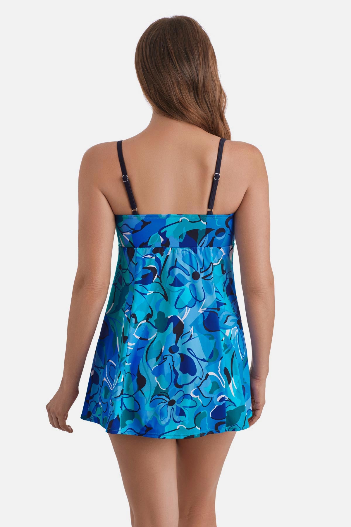 Woman faced away wearing a blue floral printed swim dress