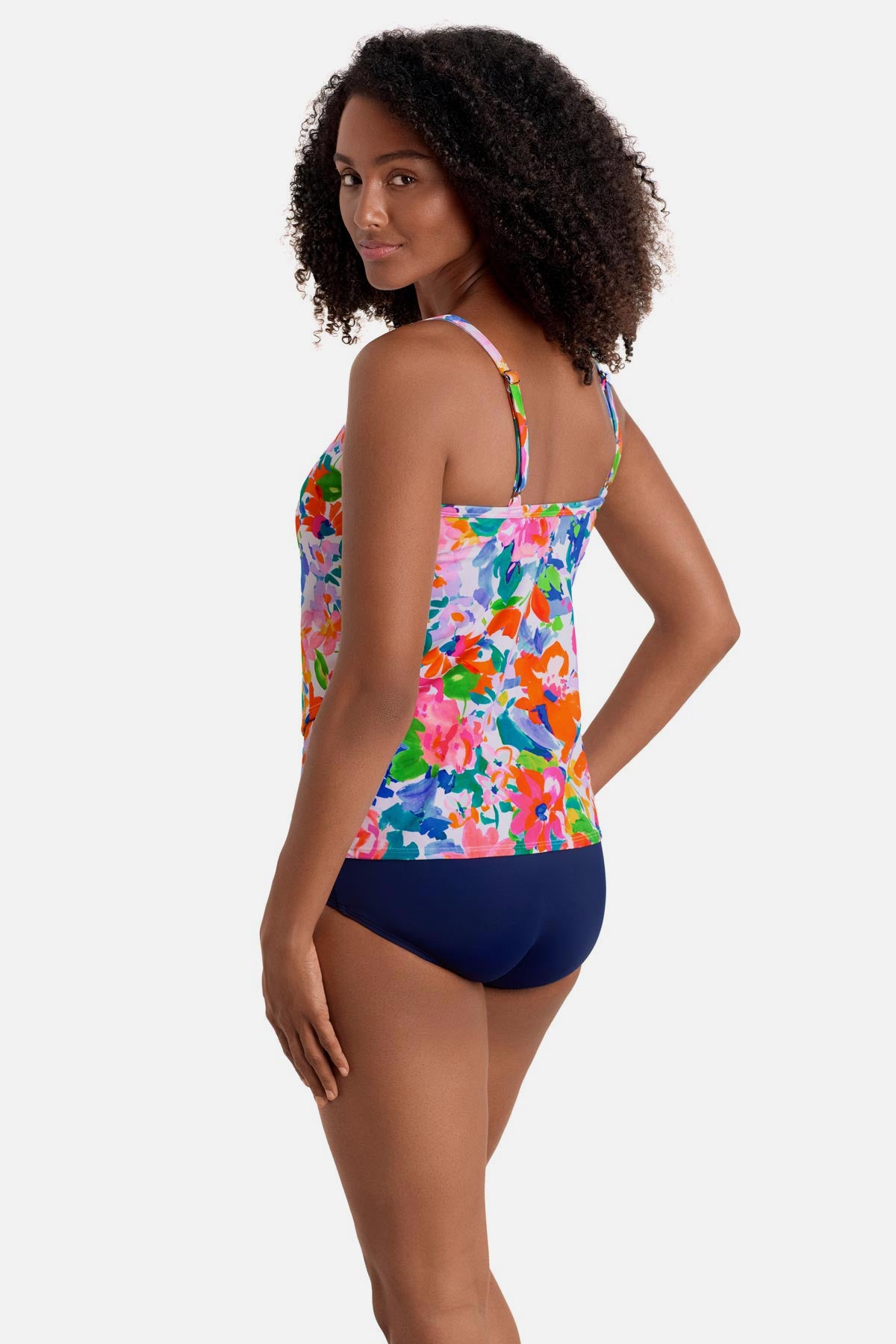 Woman turned left wearing a multicolored floral printed high neck tankini top