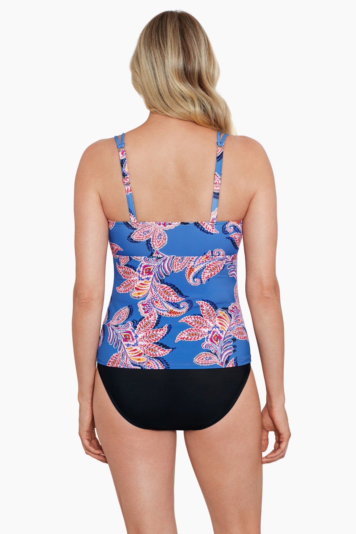 Woman turned away wearing a multicolored paisley printed V neck tankini top