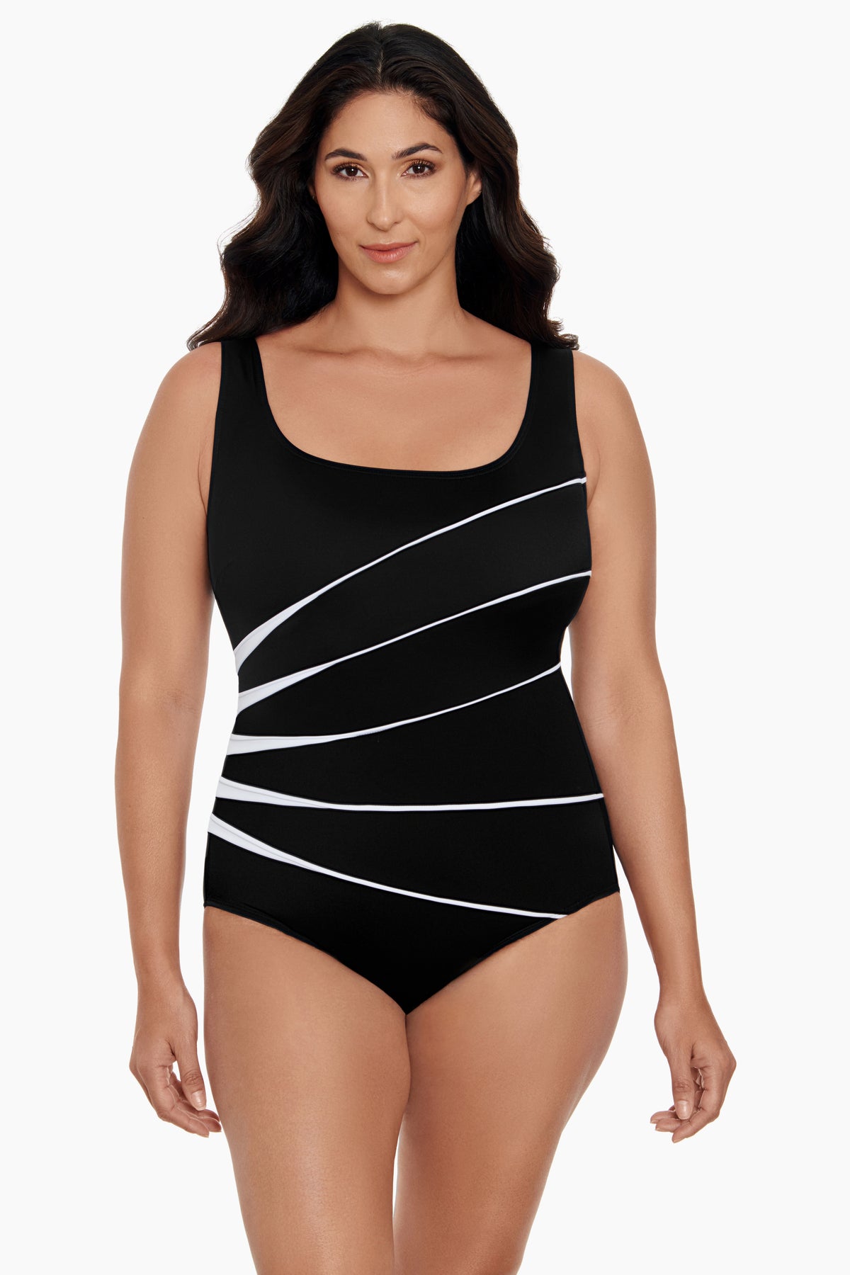 Woman wearing a black and white fan printed one-piece swimsuit