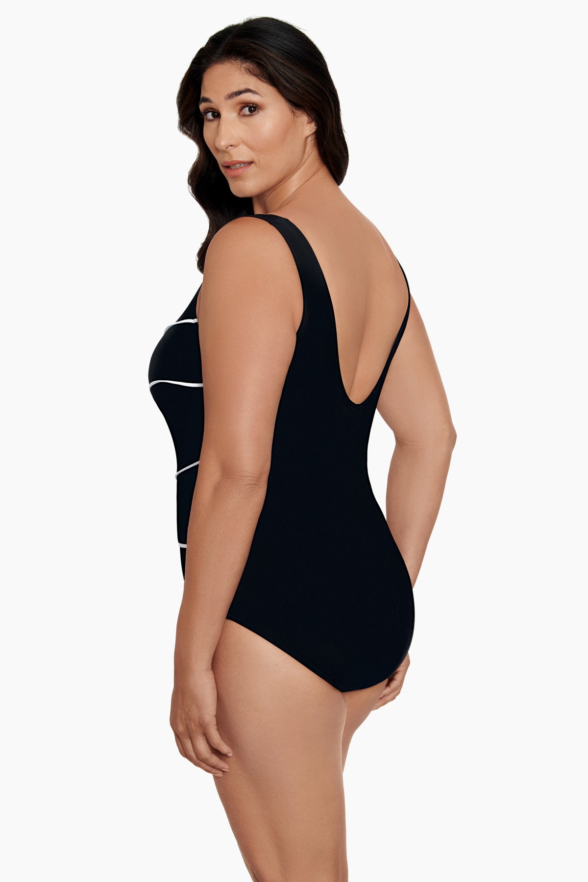 Woman turned left wearing a black and white fan printed one-piece swimsuit