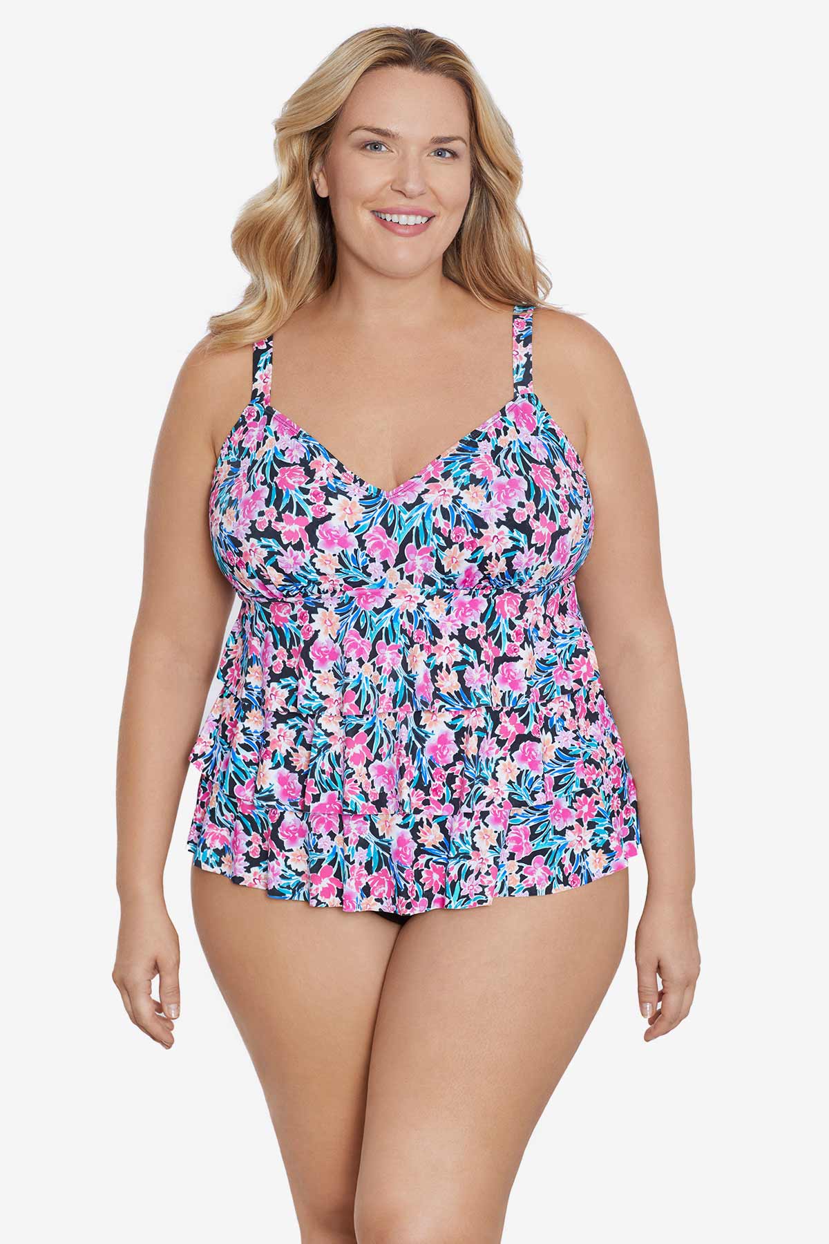 Woman wearing a multicolored floral printed tiered ruffle tankini top