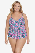 Woman wearing a multicolored floral printed tiered ruffle tankini top