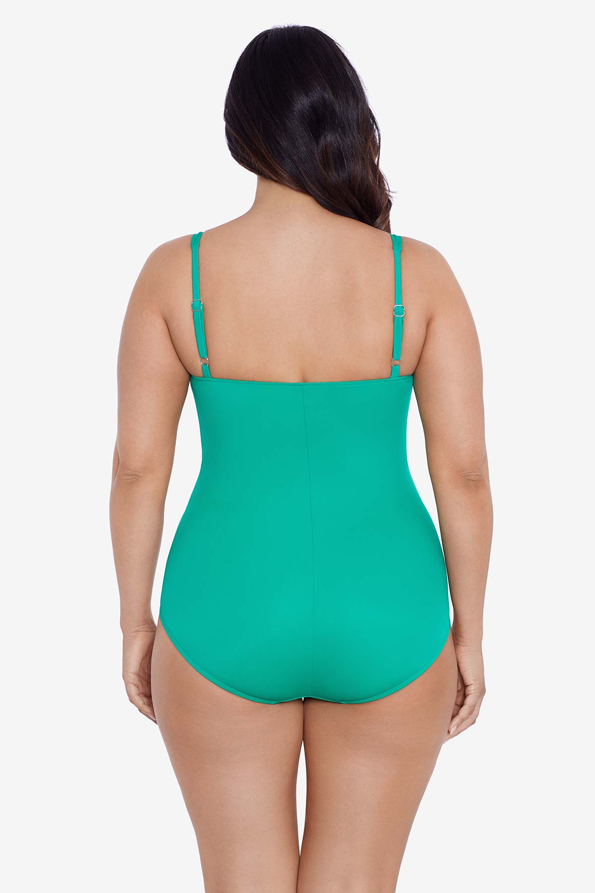 Woman turned away wearing a seafoam green one-piece swimsuit