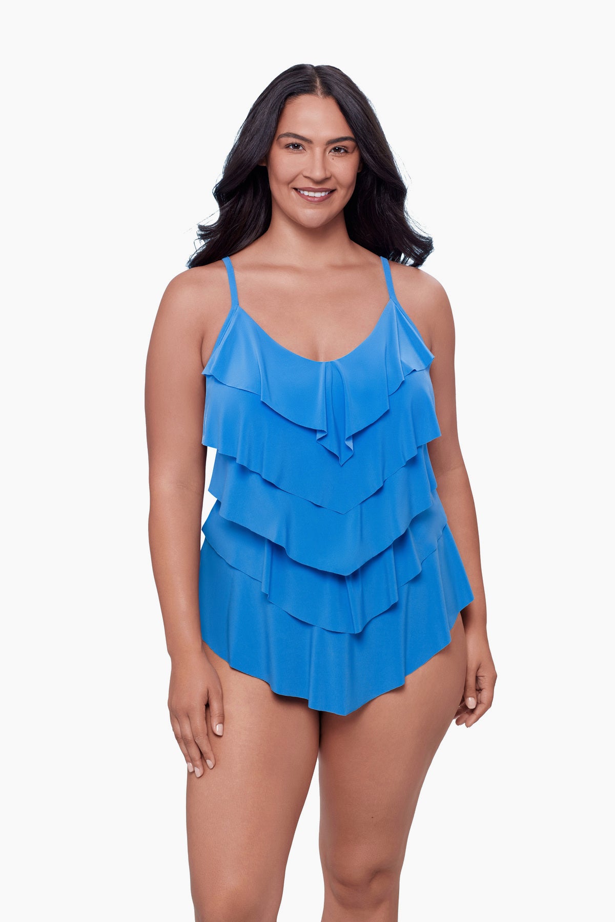 Woman wearing a tiered tankini top in light blue