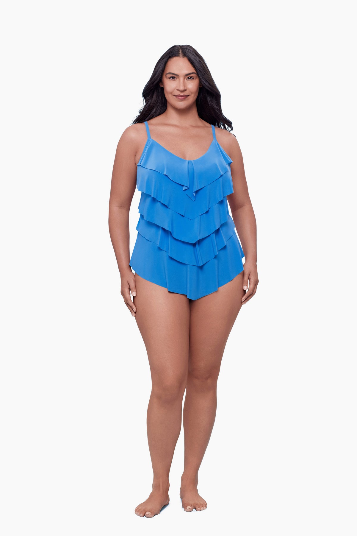 Woman wearing a tiered tankini top in light blue