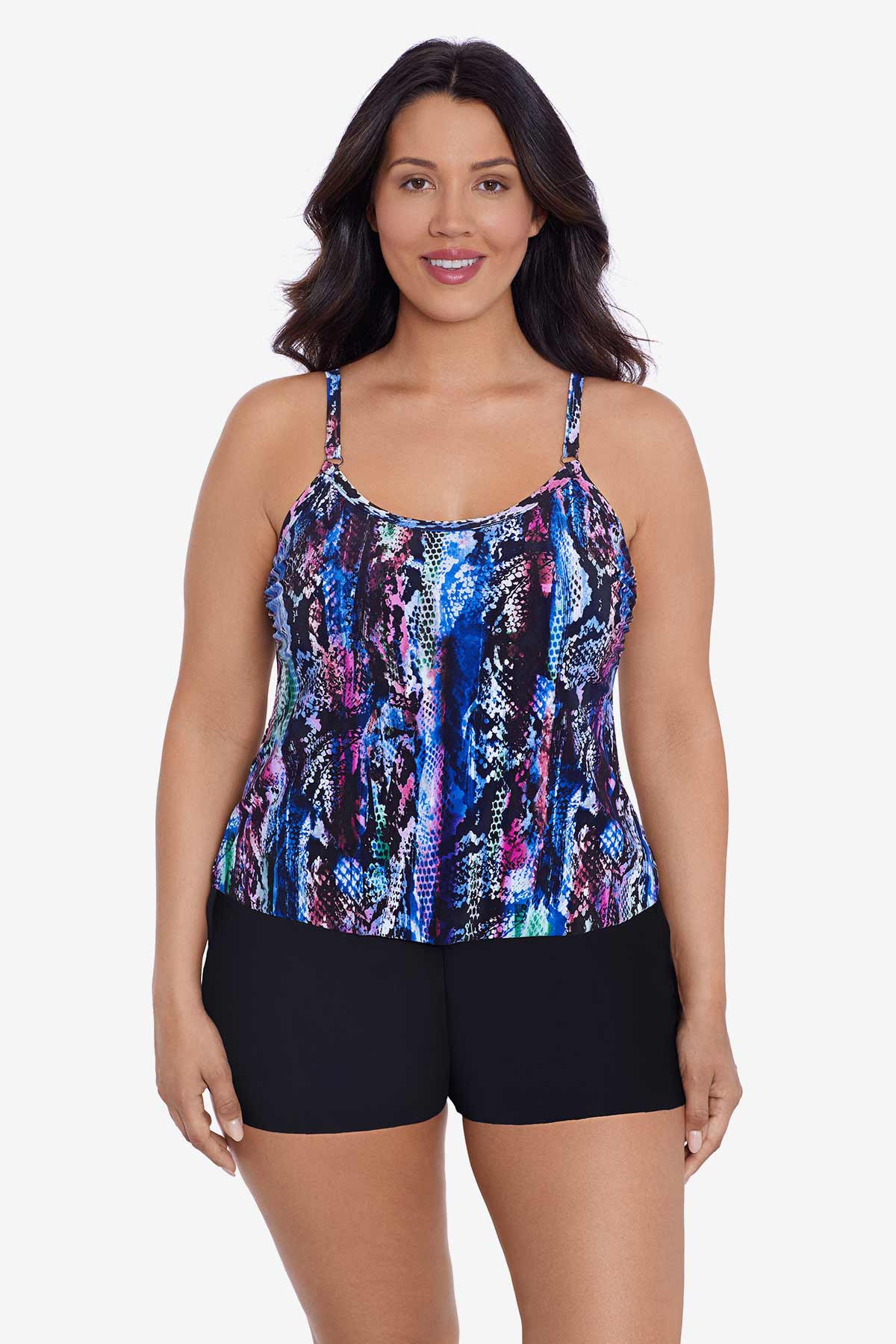 Woman wearing an abstract snakeskin printed swim romper