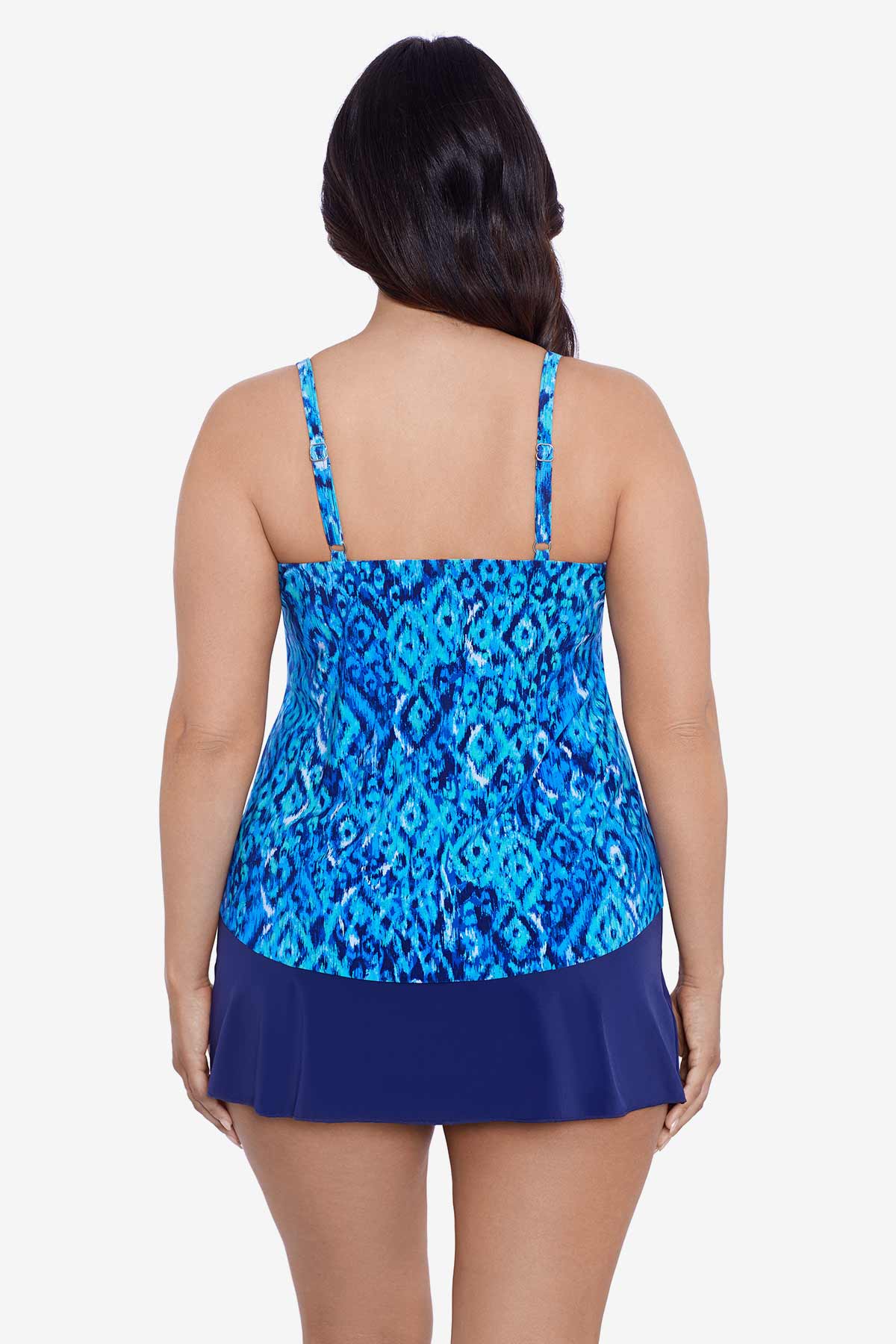 Woman faced away wearing a blue diamond printed tankini top