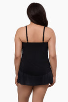 Woman wearing a tankini top 