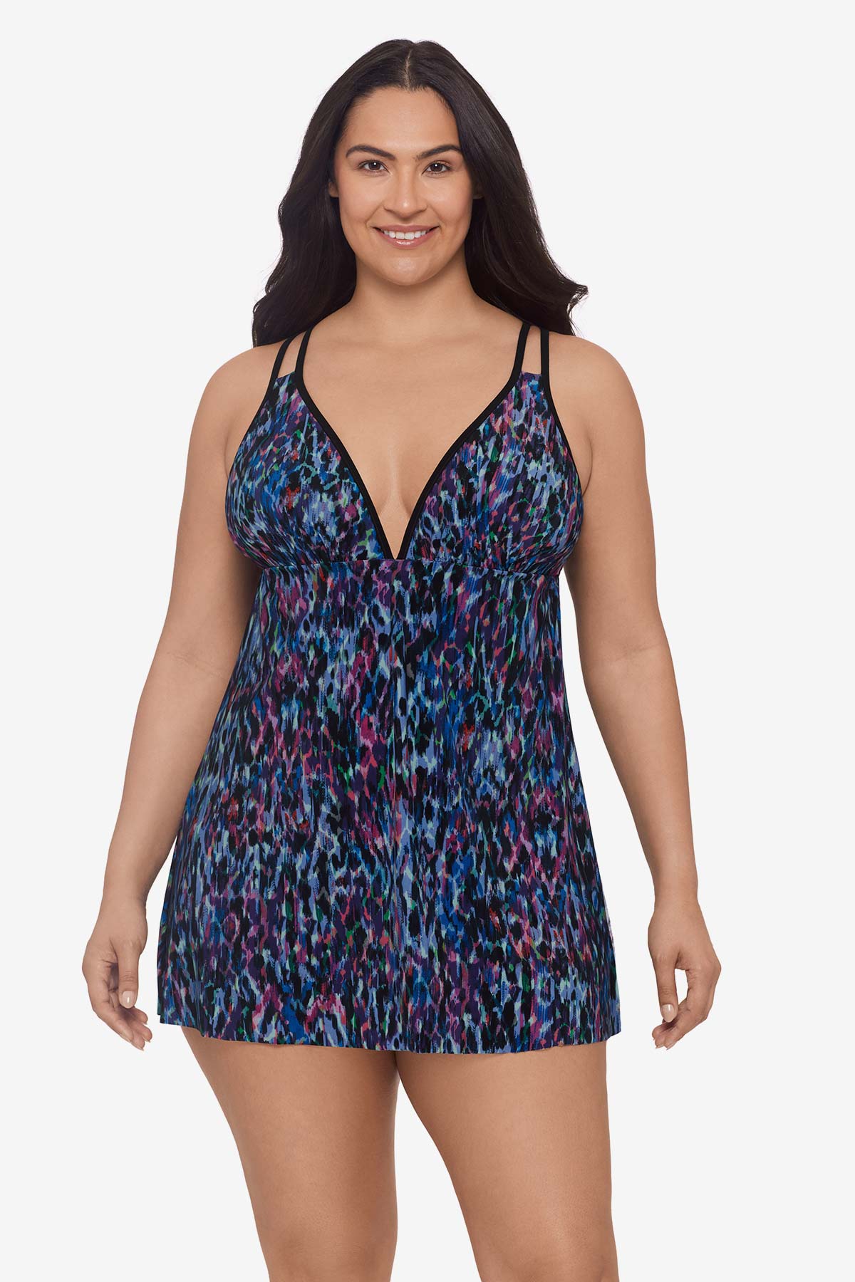Woman wearing a blue and purple abstract printed swim dress