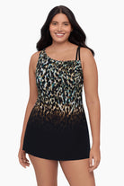 Woman wearing a swim dress with an ombre leopard print