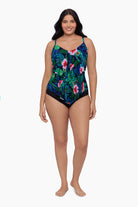 Woman wearing a tankini top with a floral pattern