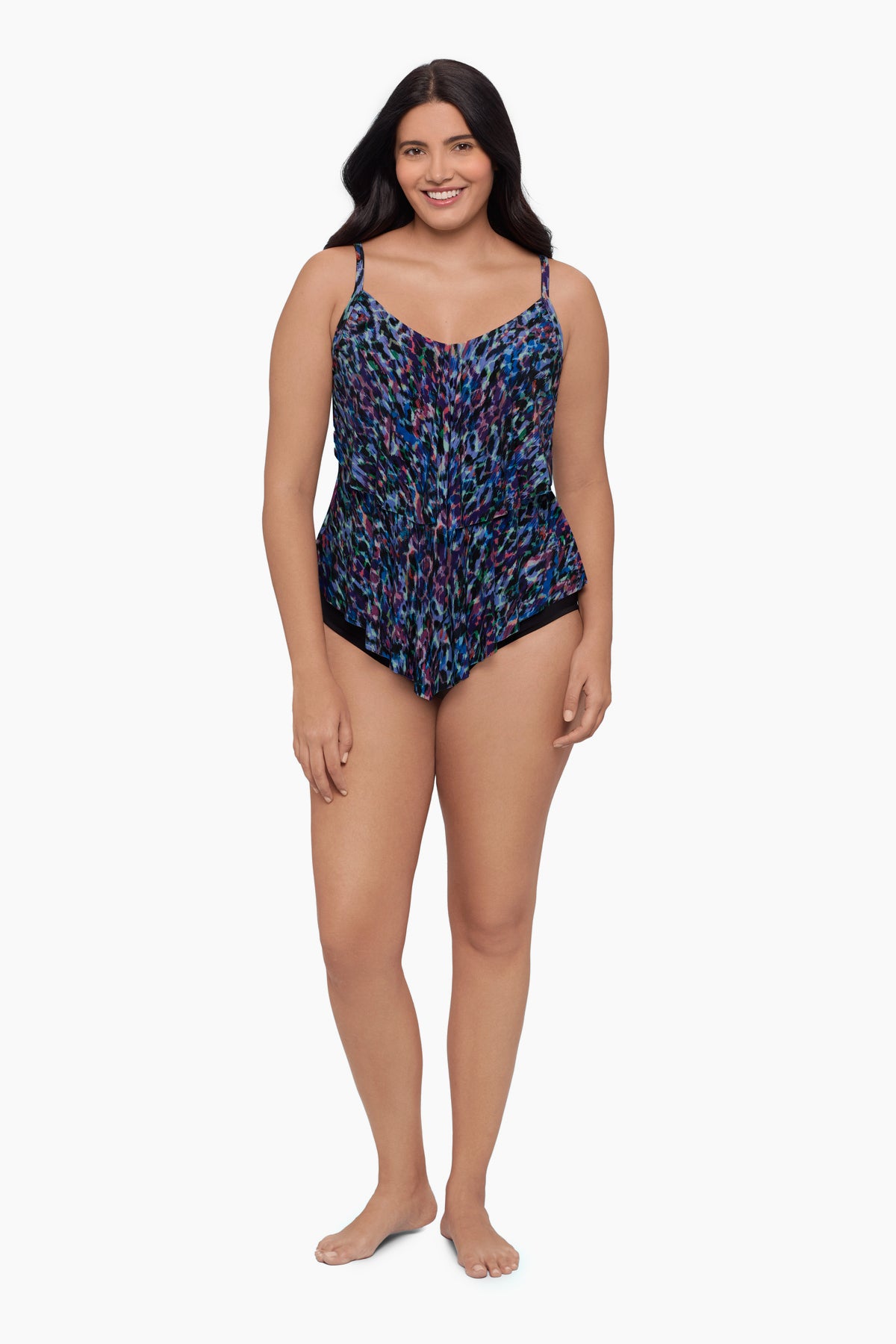 Woman wearing a tiered tankini top with a blue abstract print