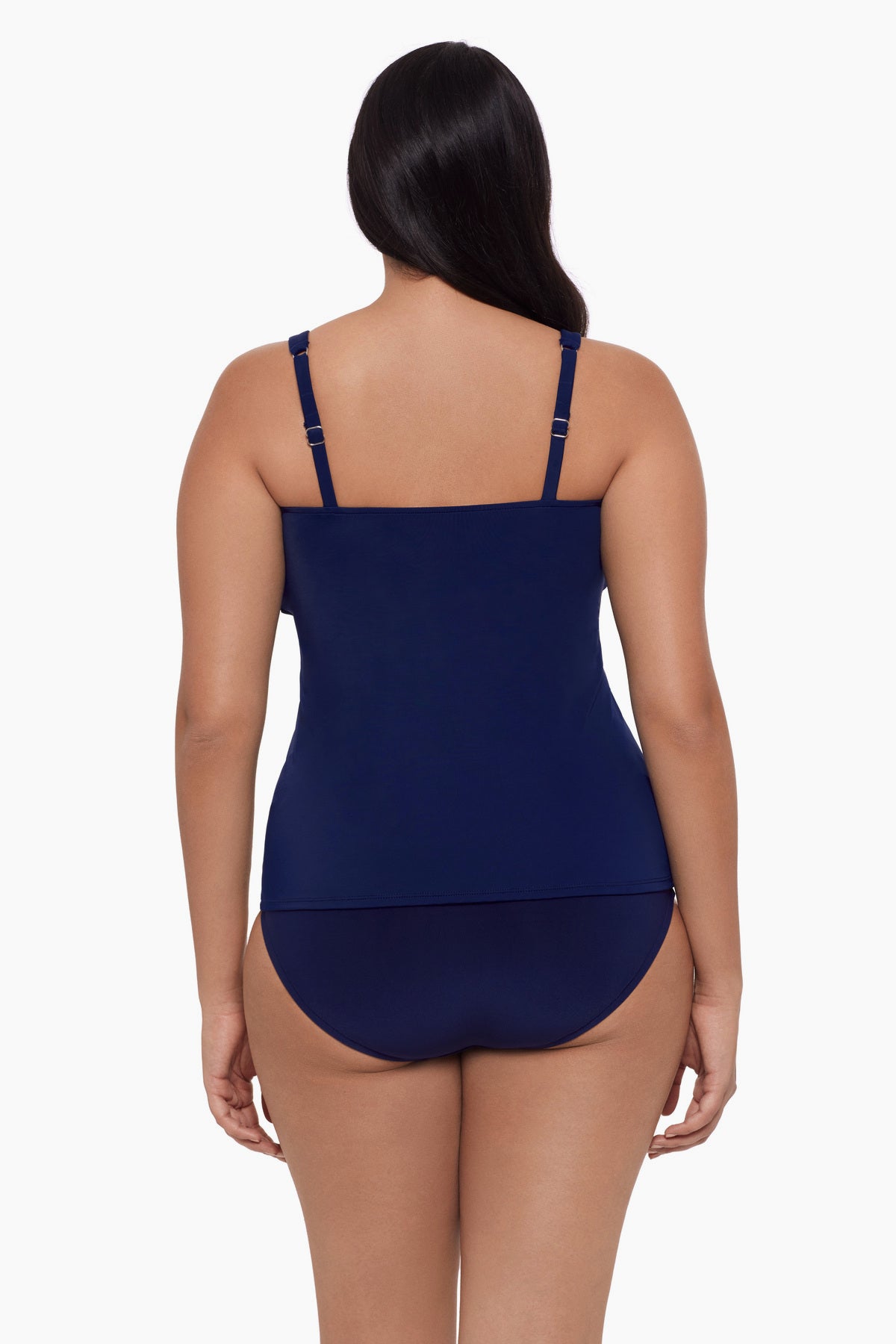 Woman turned away wearing a tankini top in ink blue
