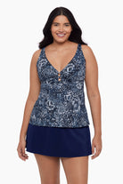 Woman wearing a tankini top with a paisley-esque print