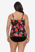 Woman faced away wearing a pink and orange floral printed tankini top