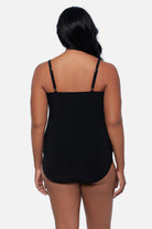 Woman turned away wearing a tankini top