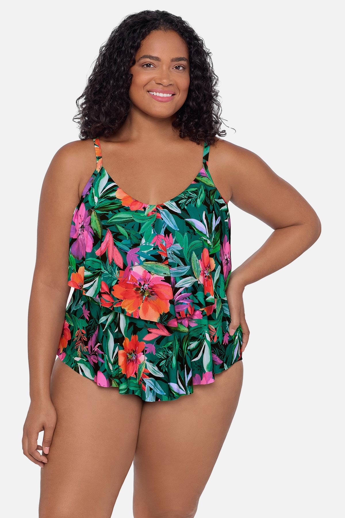 Woman wearing a multicolor floral and leaf printed tankini top