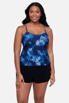 Woman wearing a blue tie dye swim romper 